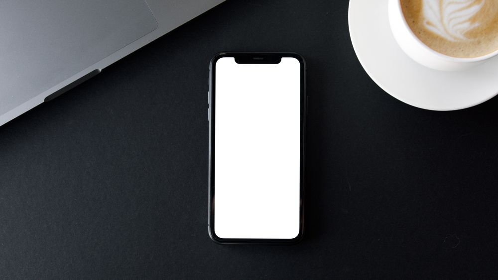 Smartphone and laptop for WhatsApp bulk message communication
