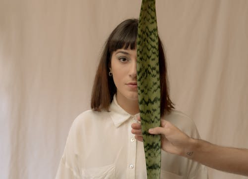 A Woman in White Button Up Shirt