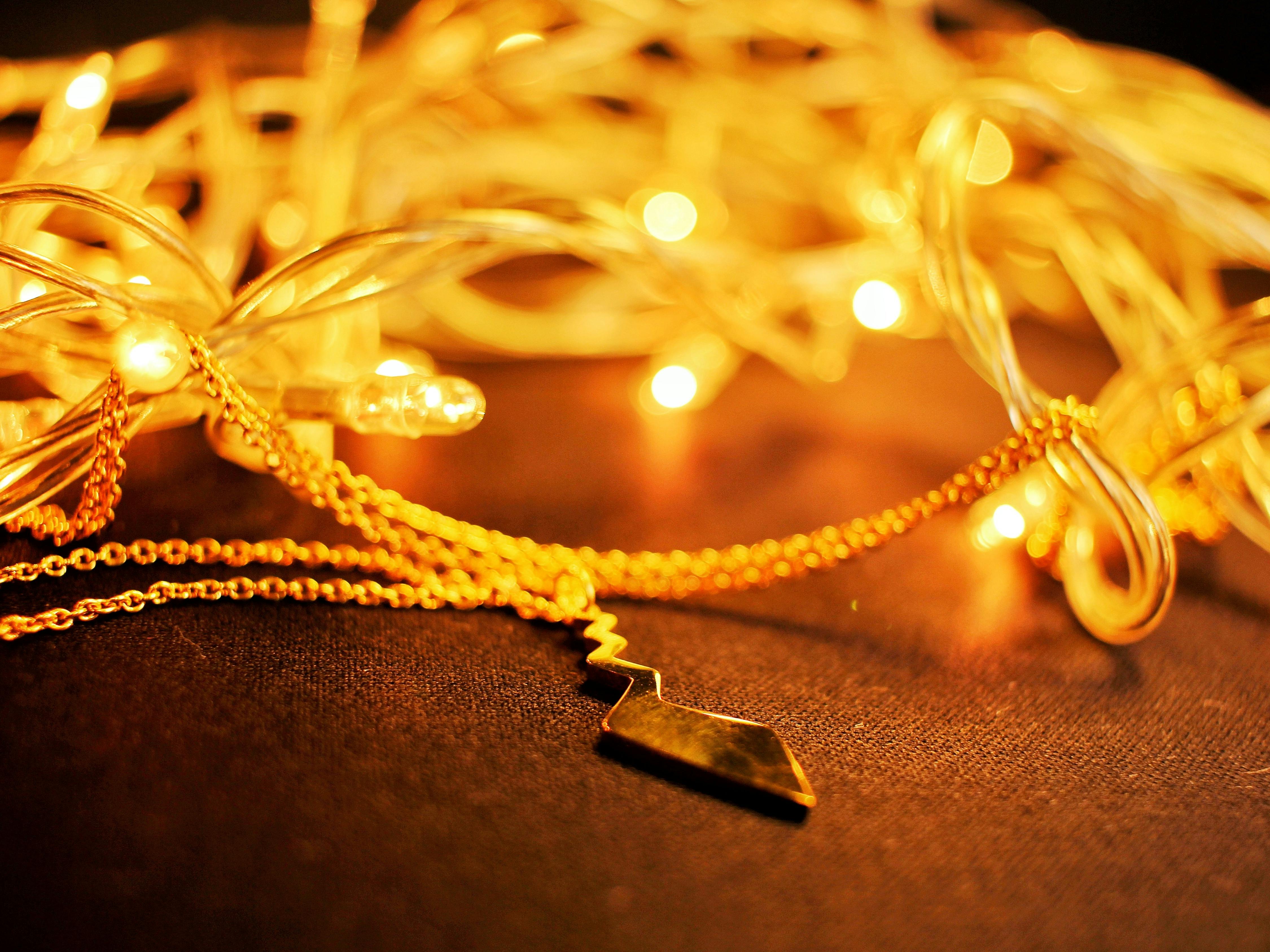 Free stock photo of bolt, lights, necklace