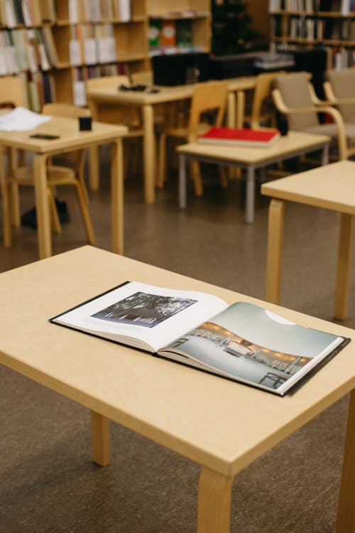 Free Open Book on the Wooden Table Stock Photo