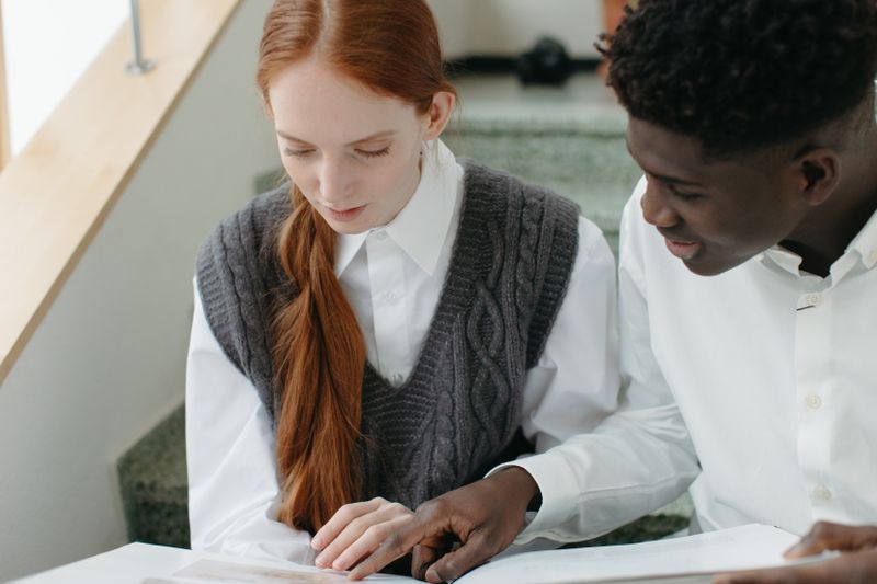 Two university students studying together at a desk