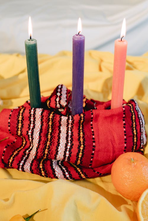 Free Burning Candles on the Table Stock Photo