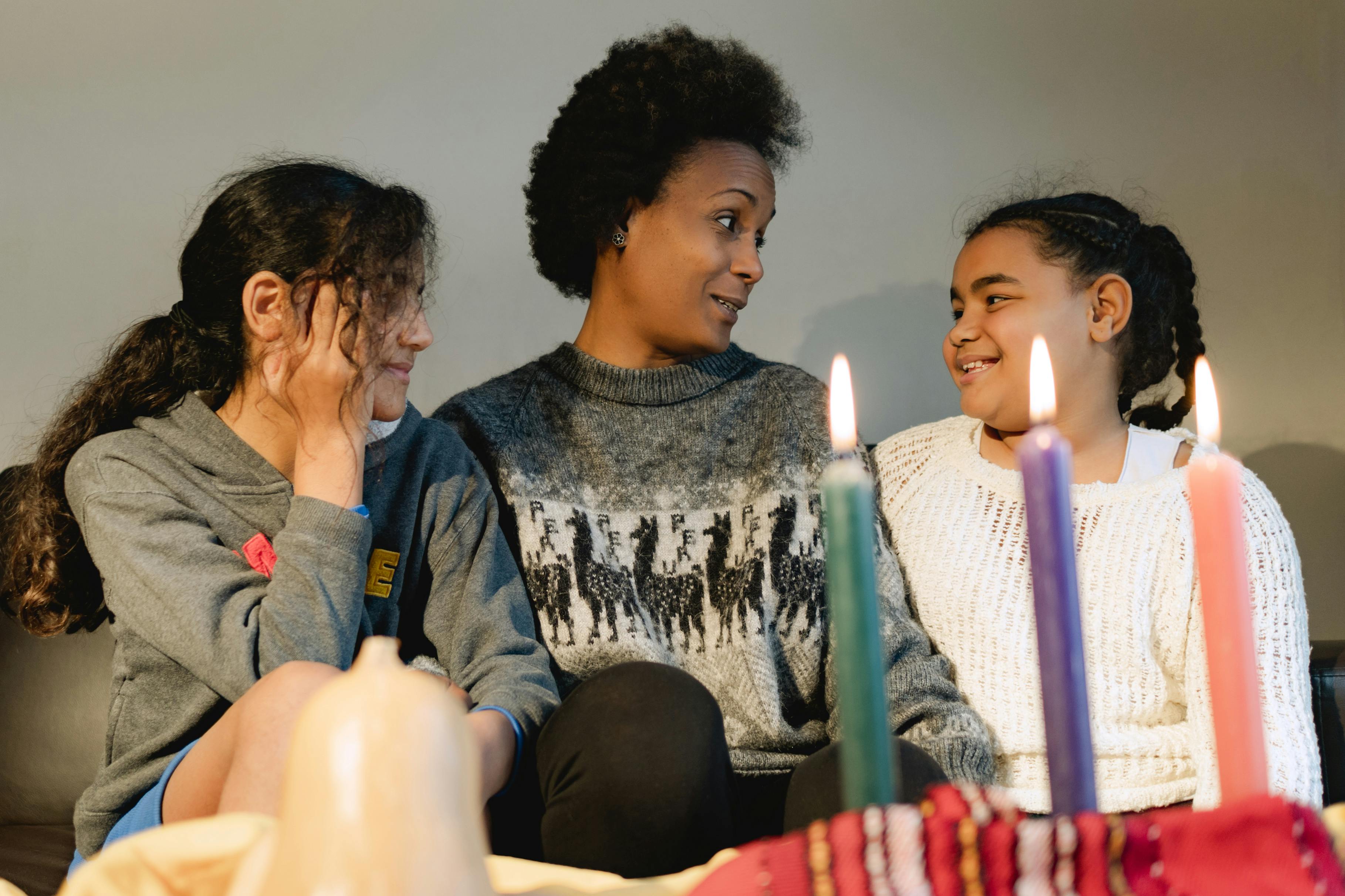 A Family Sitting On The Couch Free Stock Photo   Pexels Photo 6280133 