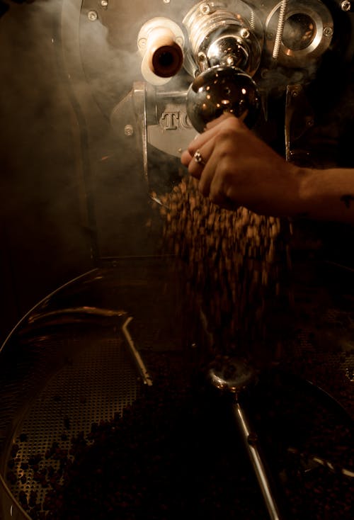 A Person Roasting Coffee Beans