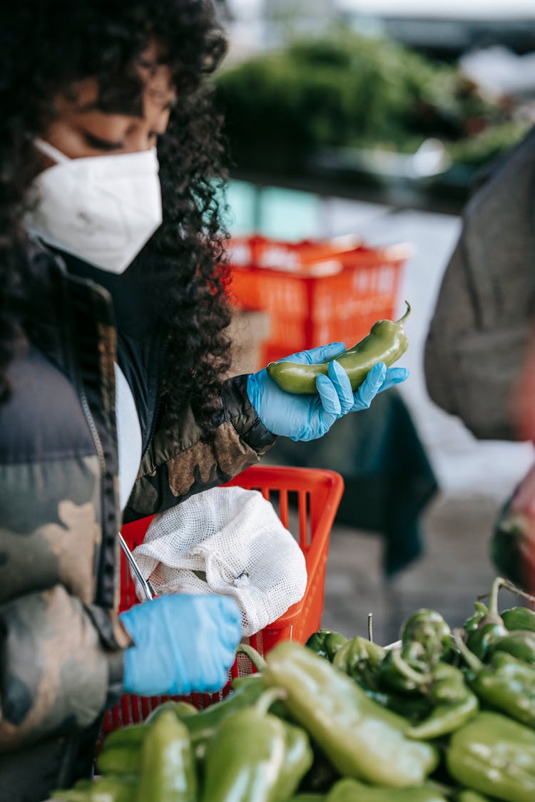 Crop Black Woman Choosing Vegetables In Supermarket