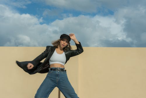 Free Woman Wearing a Black Jacket Dancing  Stock Photo