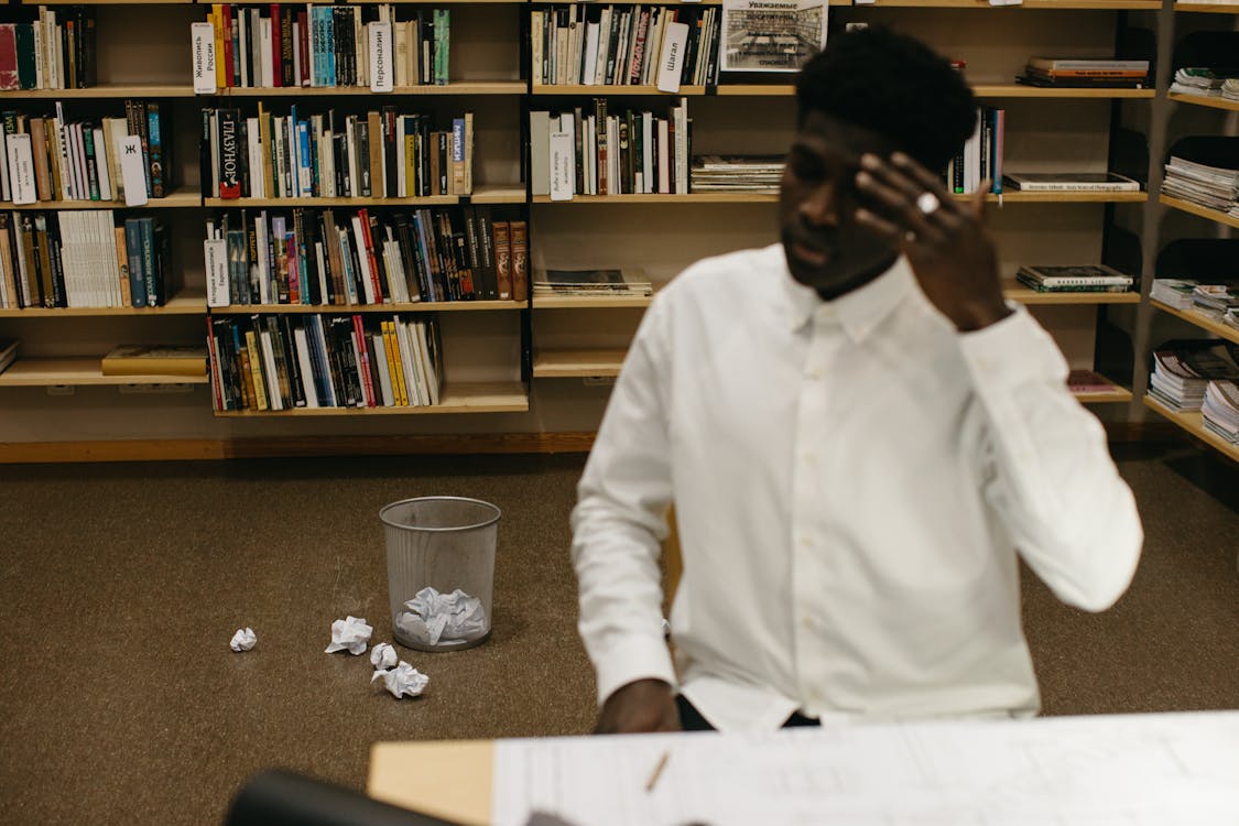 A Man Sitting at the Table · Free Stock Photo