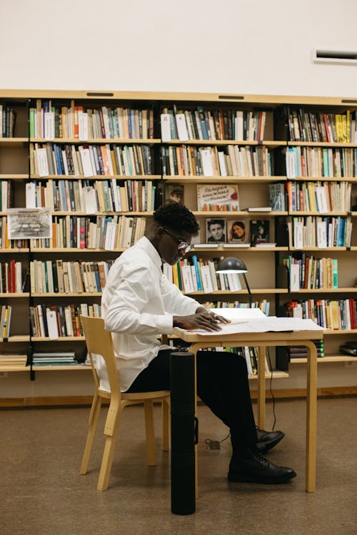 A Student Drafting in the Library