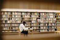 A Man Sitting at the Table