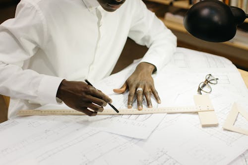 A Person Holding a Pencil