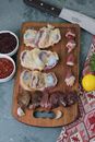 Raw Meat on the Wooden Chopping Board