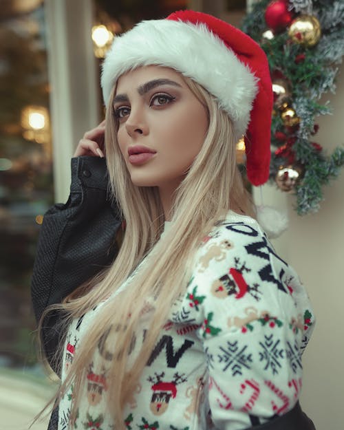 Woman Wearing a Santa Hat