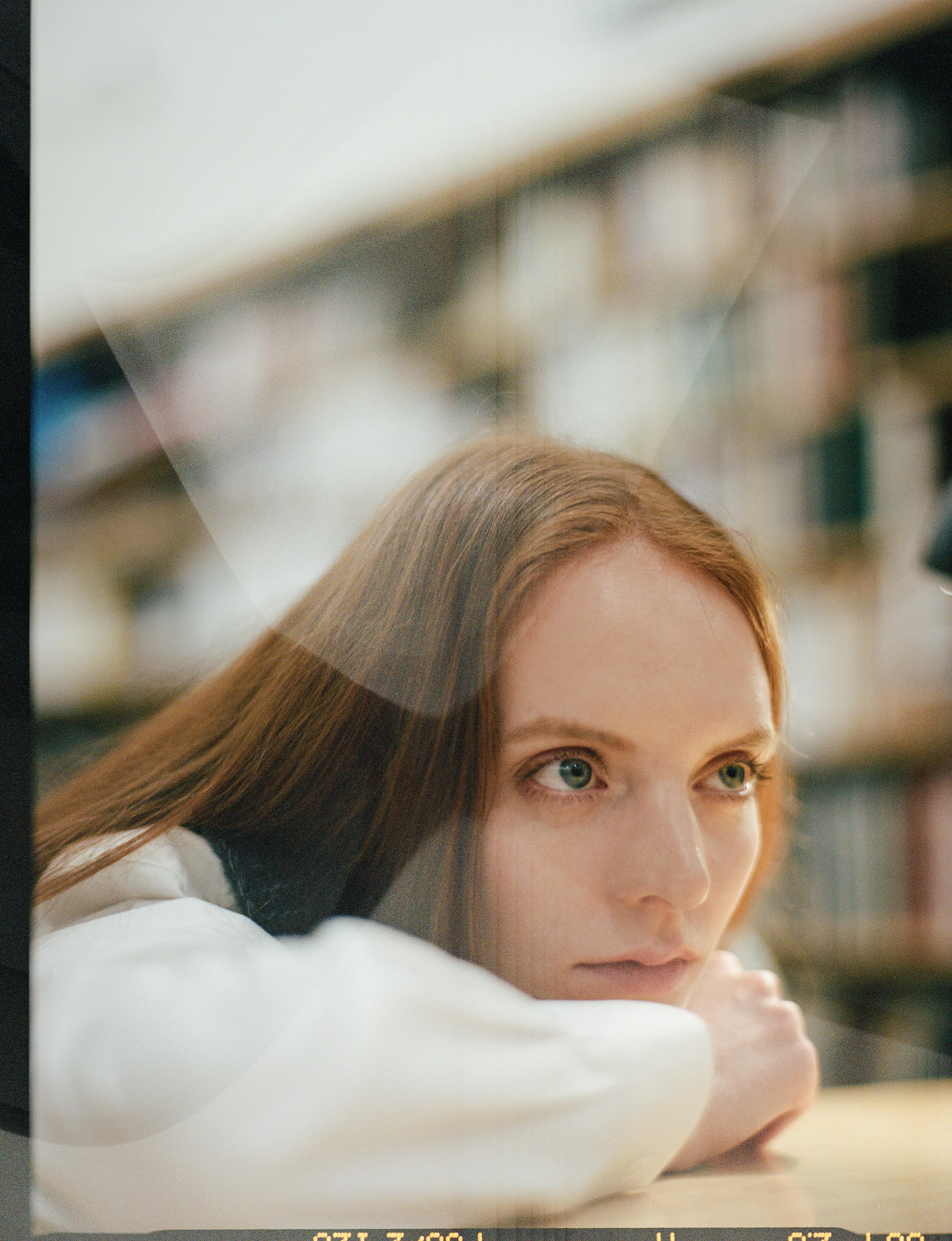 a woman in white long sleeve shirt