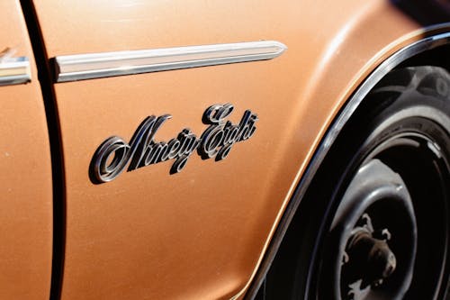 Letters on Orange Vintage Vehicle