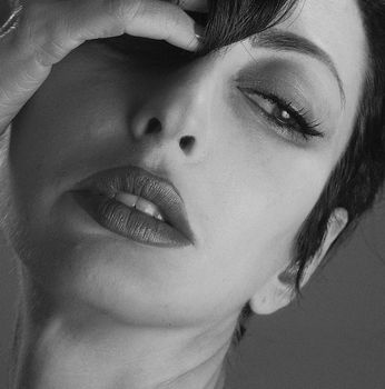 Striking black and white close-up portrait of a woman in Kyiv, Ukraine.
