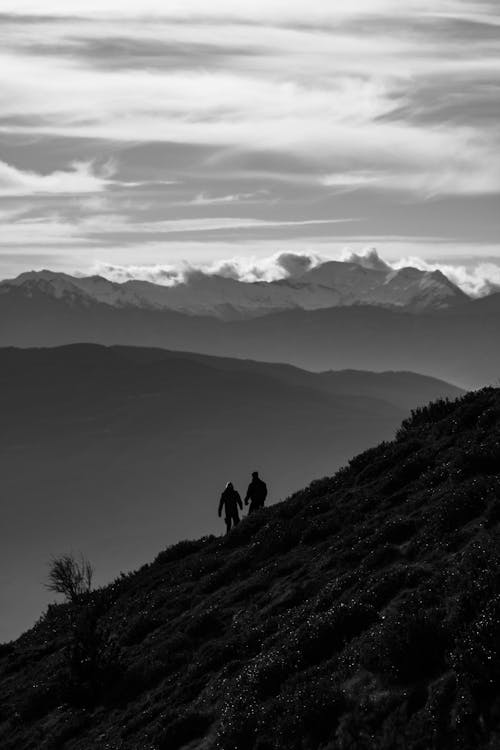 People Walking on a Valley