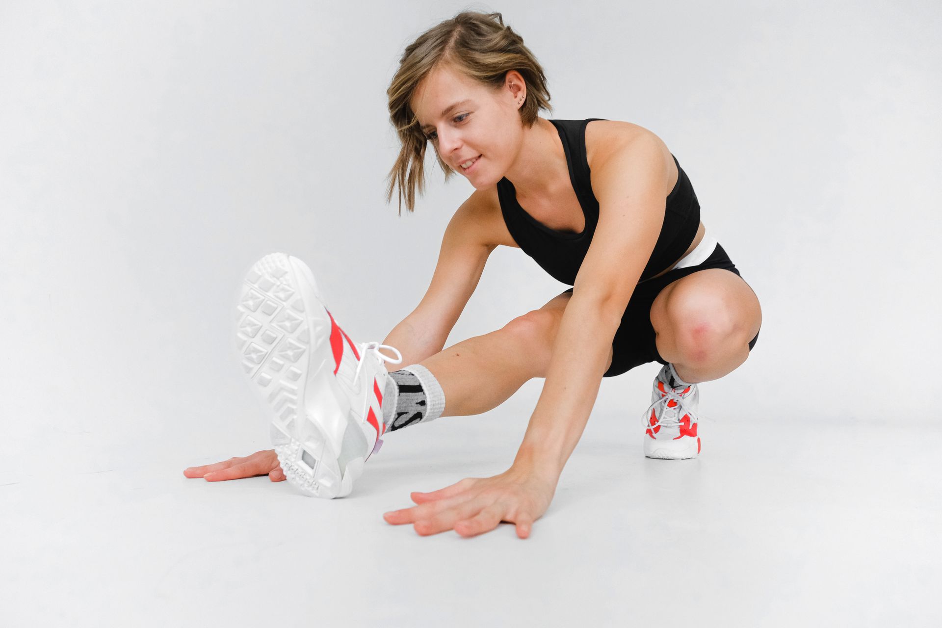 Woman Stretching Before Workout