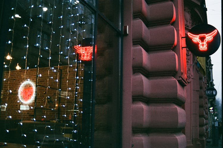 Close Up Of Shop Window And Neon Sign