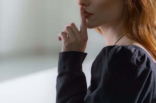 A Person in Black Long Sleeve Top