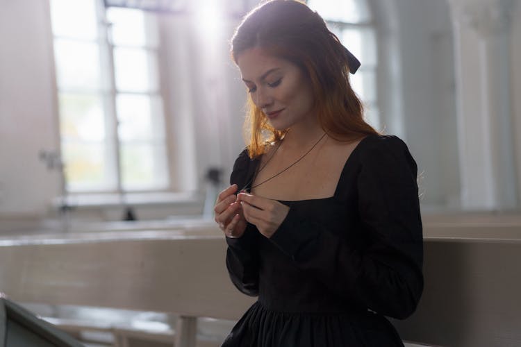 Redhead Woman Wearing Black Dress