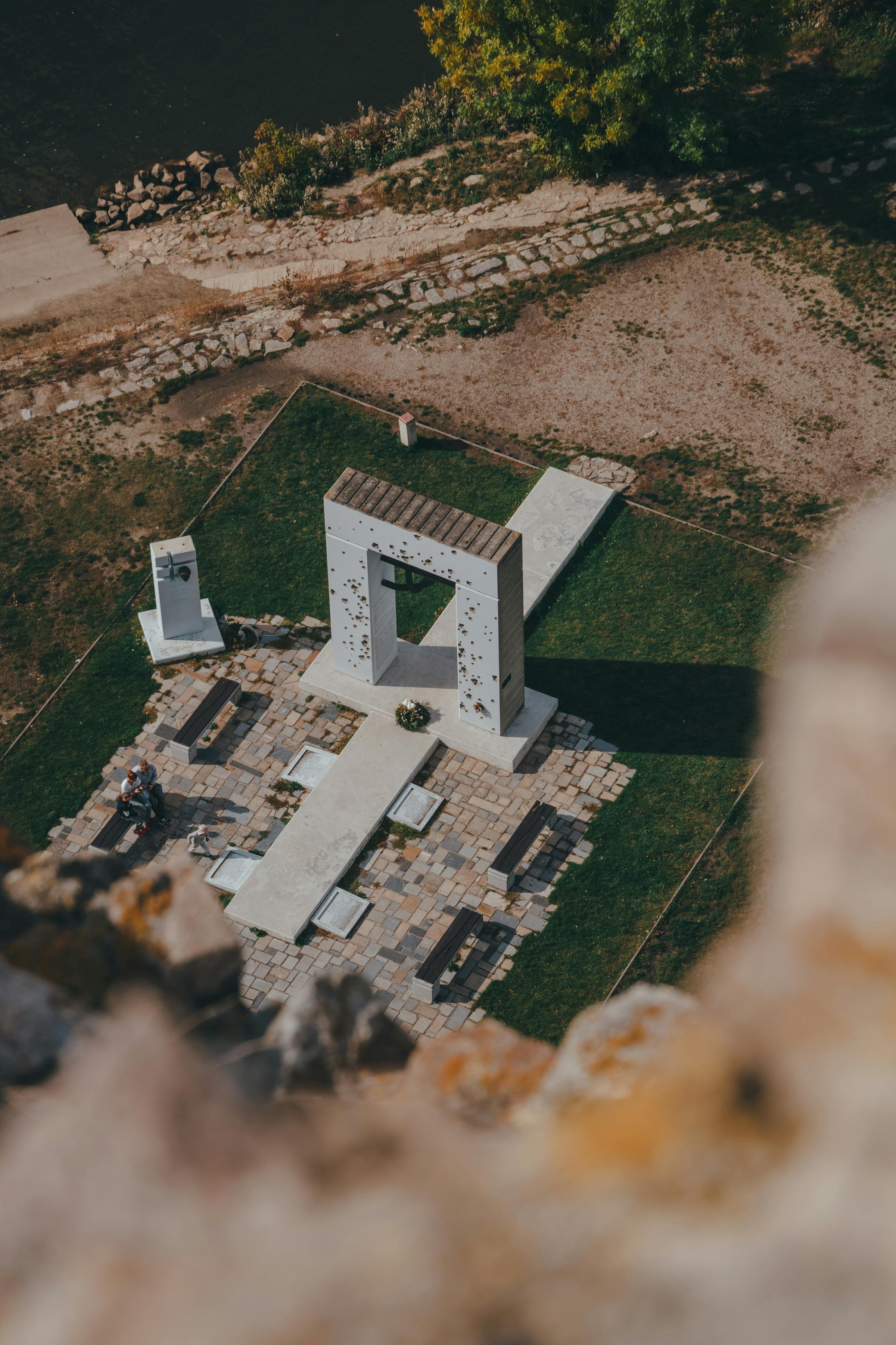 A captivating aerial shot of the Gate of Freedom Memorial in Bratislava, Slovakia, from above.