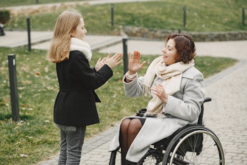 Girl and Woman Playing