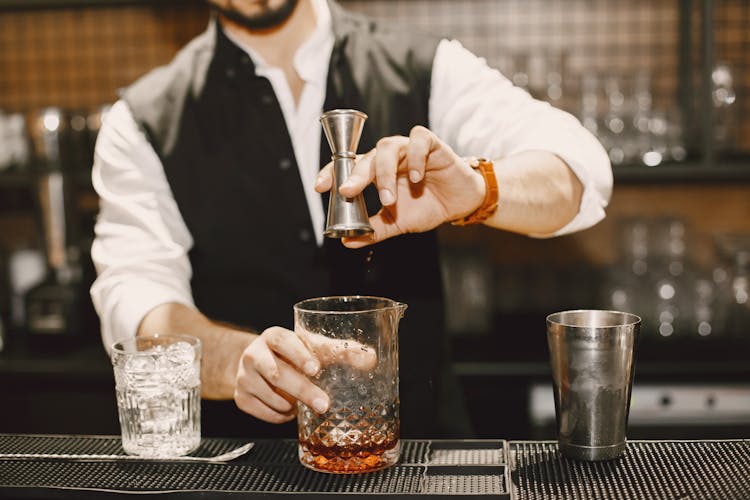 A Man Mixing Drinks