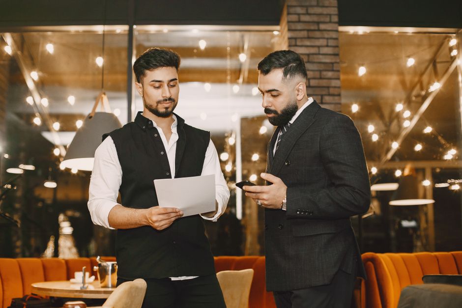 restaurant owner reviewing paperwork