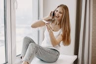 Happy Woman Holding a Pregnancy Test