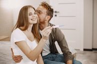 Man Kissing Woman on the Cheek
