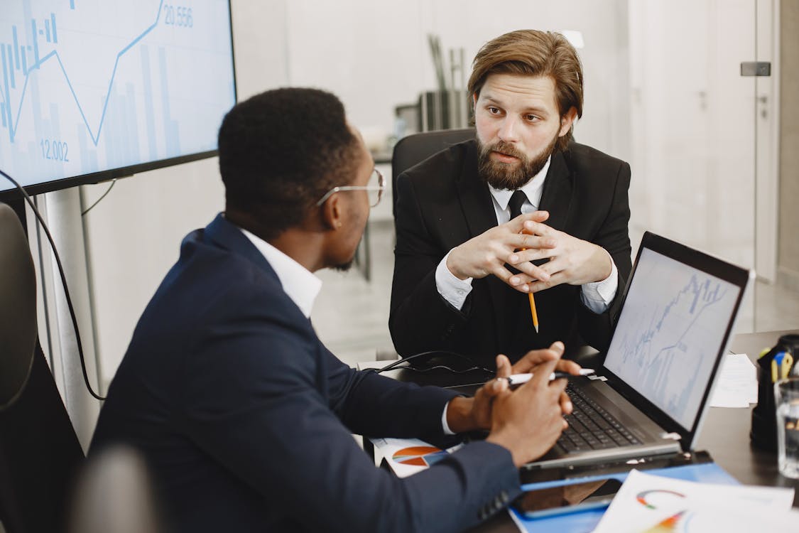 Small business owner discussing funding options with a financial advisor