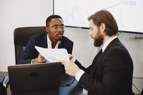 Businessmen with Documents