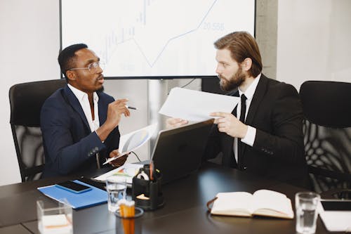 Men in Suit having a Meeting