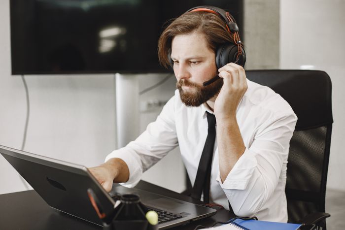 A marketer joining an Ostara webinar from their desk — photo by Gustavo Fring on Pexels