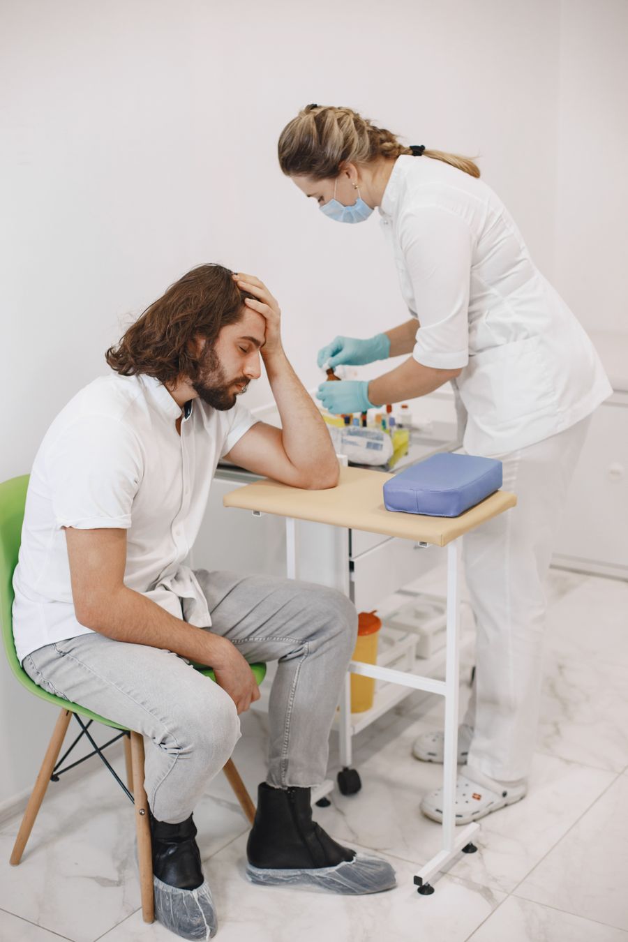 Patient receiving medical assessment and support