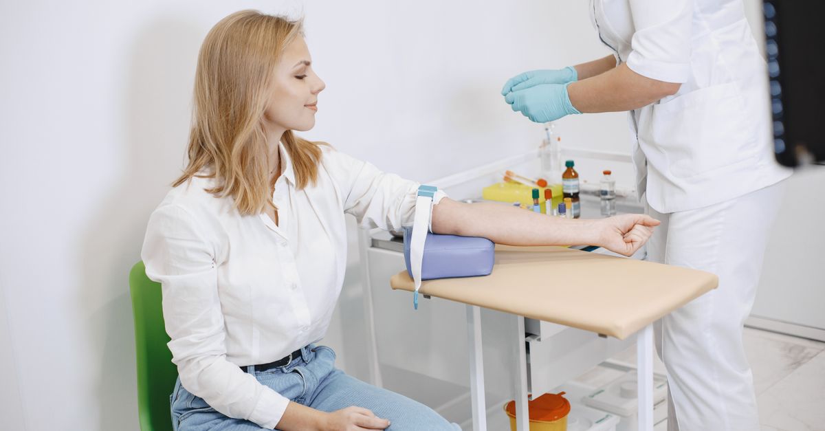 Woman getting a blood test to check thyroid and weight gain after 40