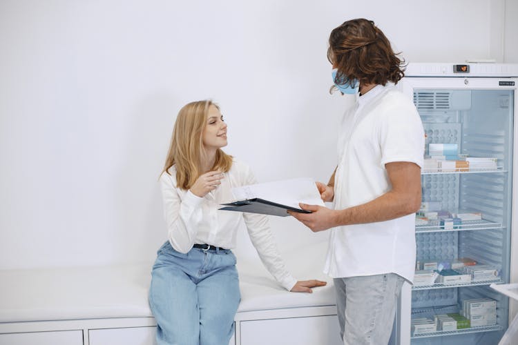 Woman Consulting Her Health With Doctor