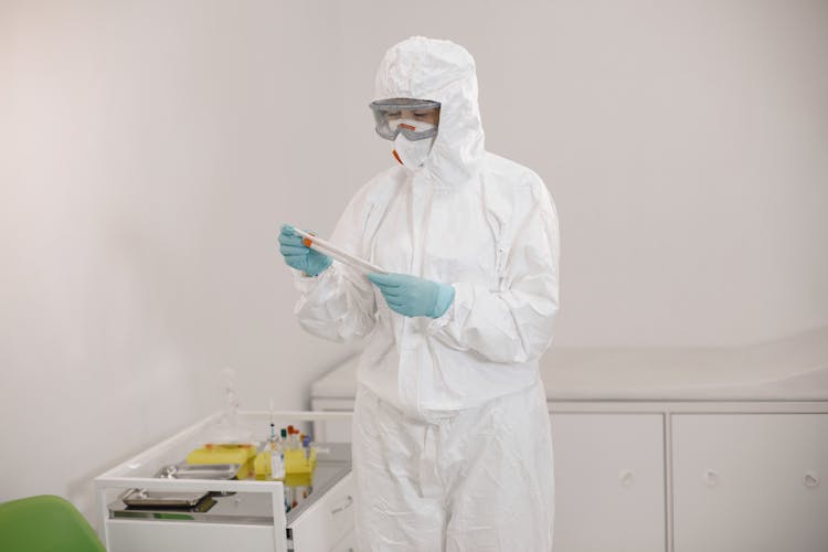 Nurse Wearing Clean Suit In A Laboratory 