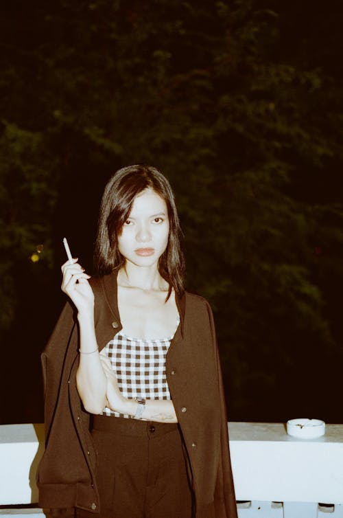 Free Woman Smoking a Cigarette Stock Photo