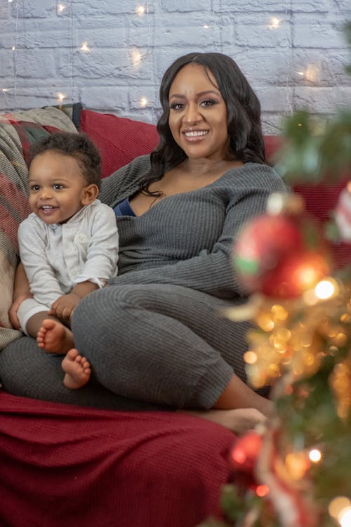 Smiling Mother and Son in Pajamas