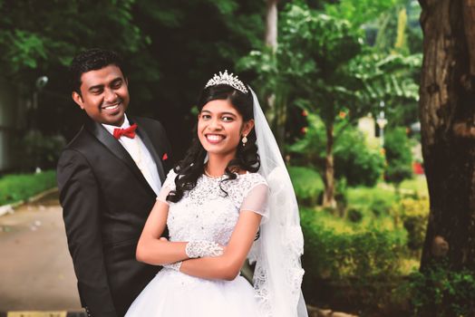 Shallow Focus Photo of Smiling Newlyweds