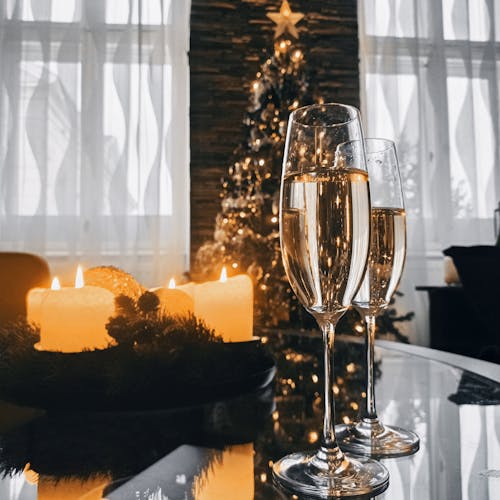 Lighted Candles and Champagne Glasses