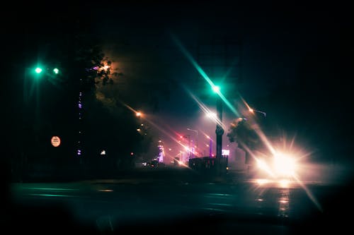 Lights of car in dark city