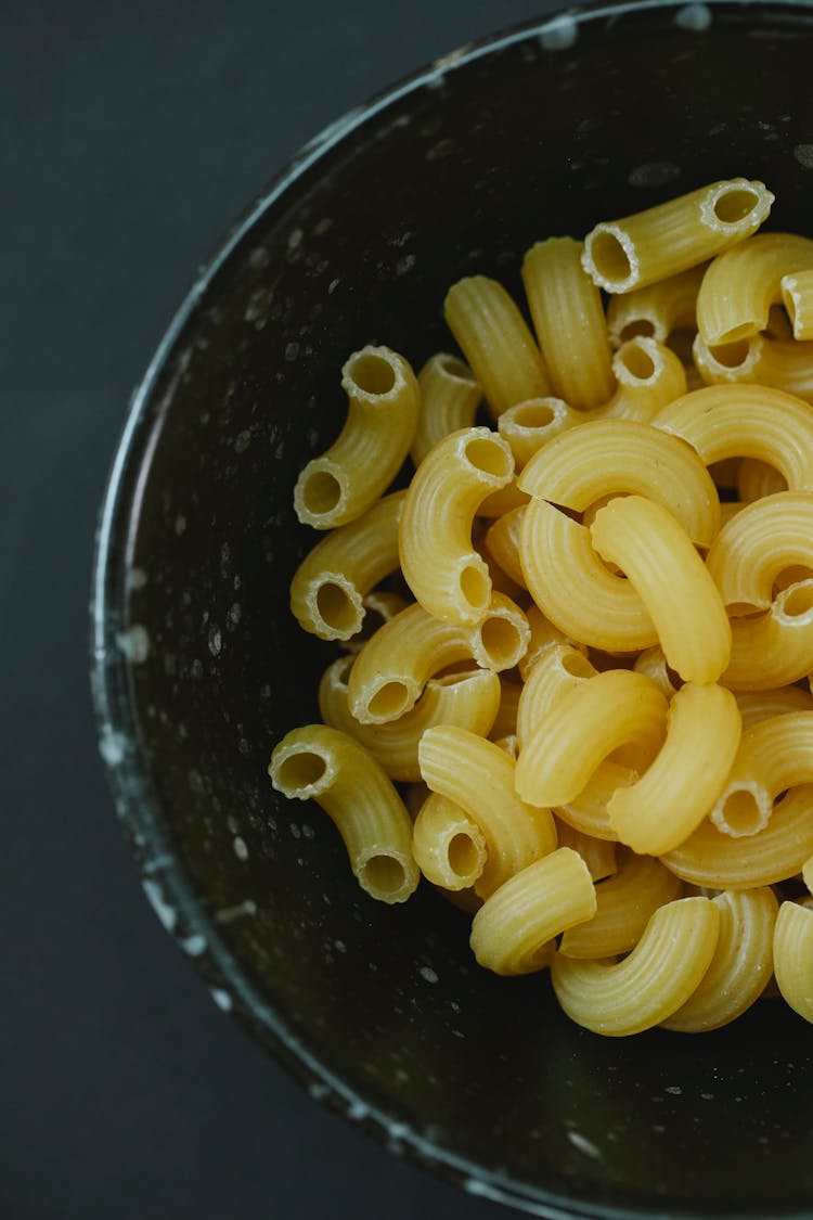 Elbow Macaroni In Bowl On Table