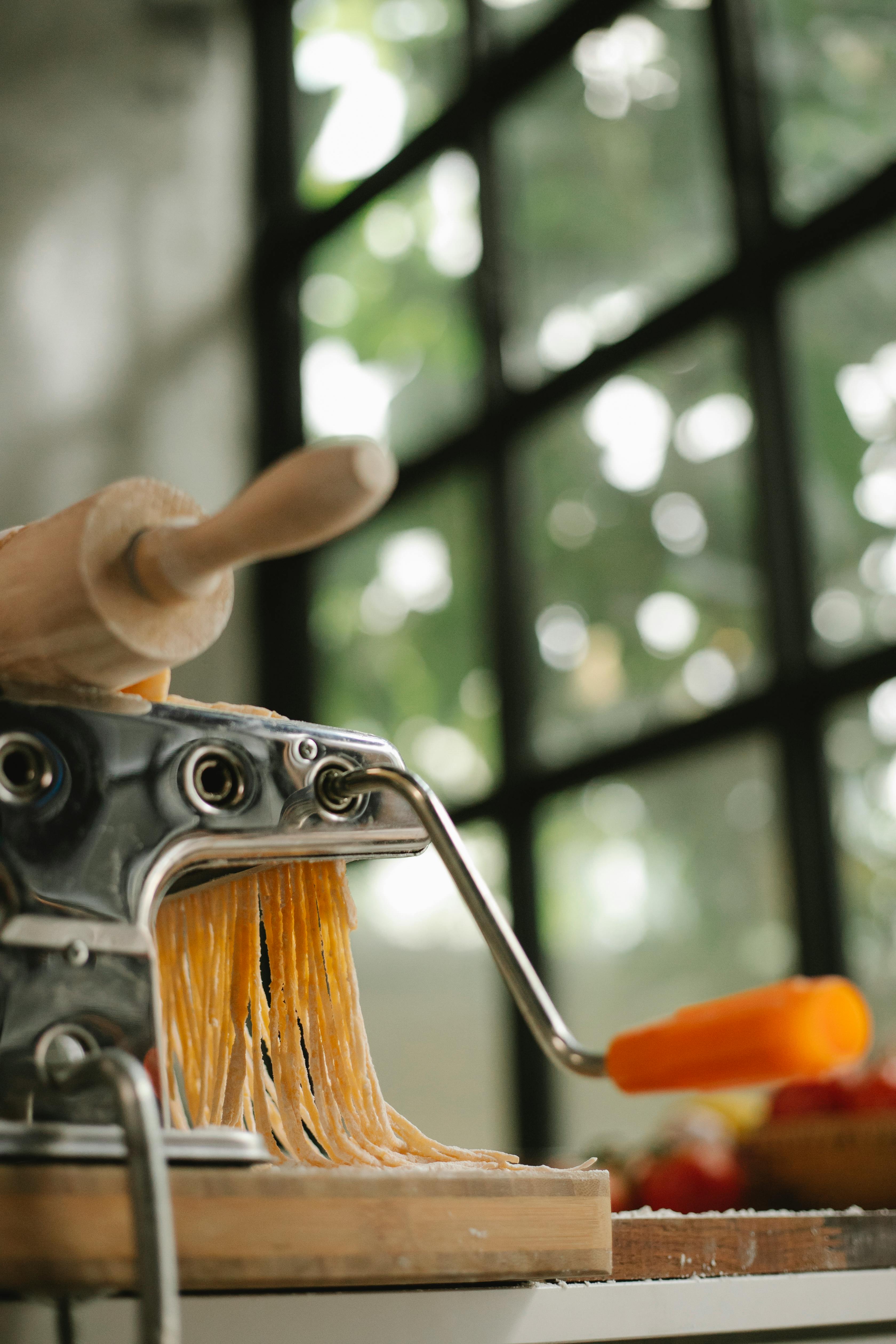 Automatic Pasta Machine Household Pasta Maker On A Kitchen Stock Photo -  Download Image Now - iStock