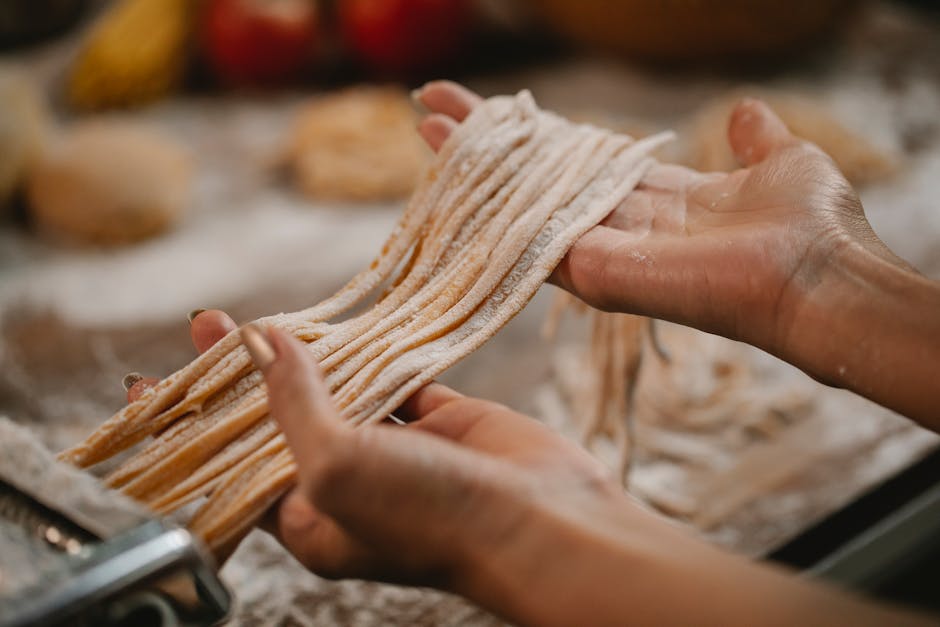 fresh, handmade pasta being prepared - italian delivery gold coast fresh, handmade pasta being prepared - italian delivery gold coast