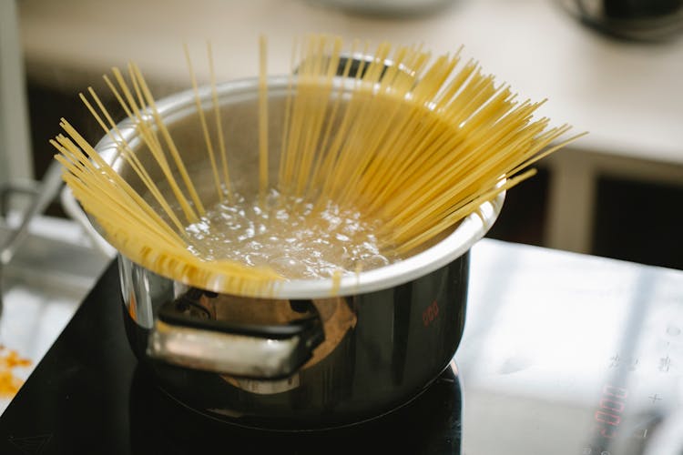 Spaghetti Cooking In Boiling Water In Saucepan