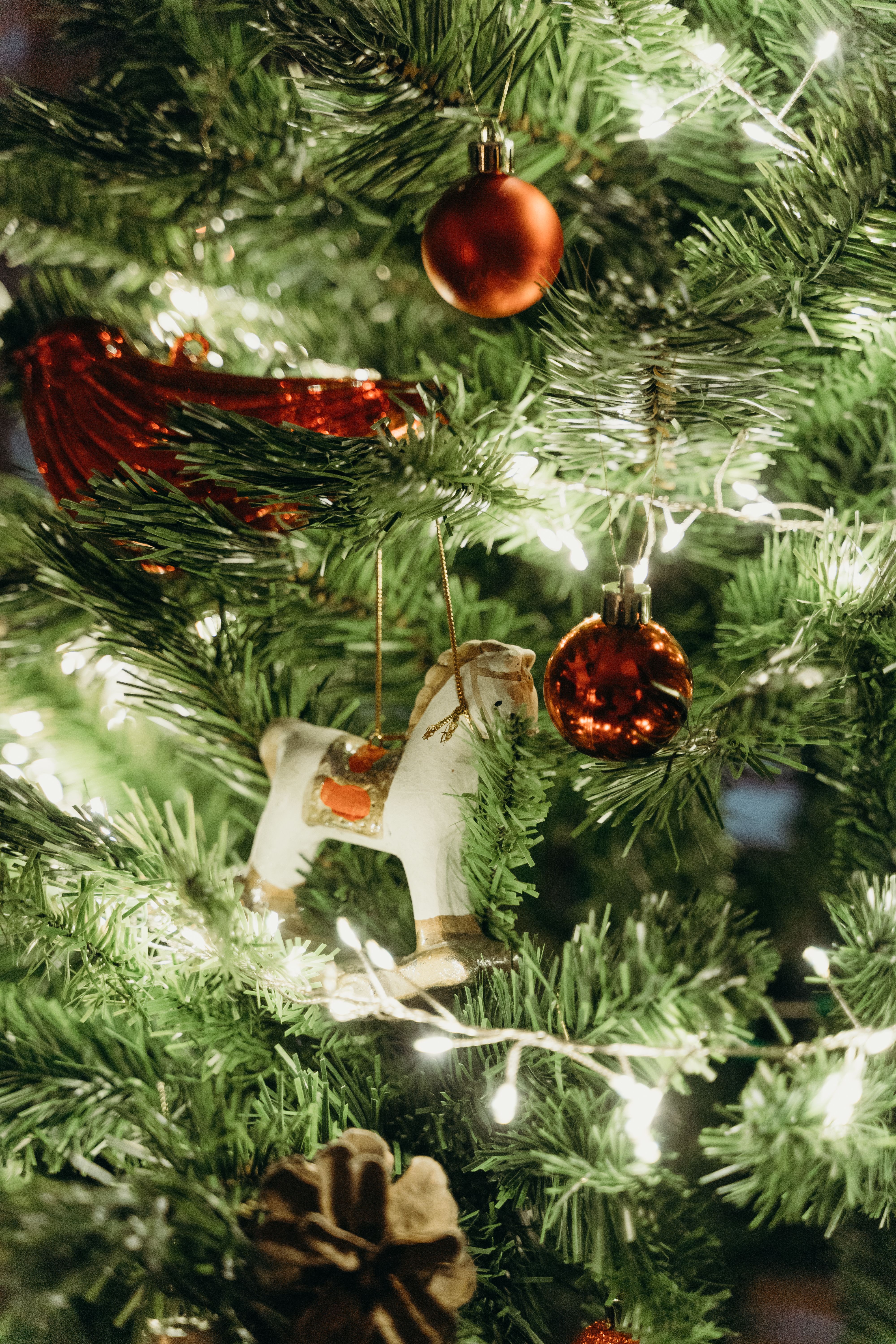 Red And Gold Baubles On Green Christmas Tree Free Stock Photo