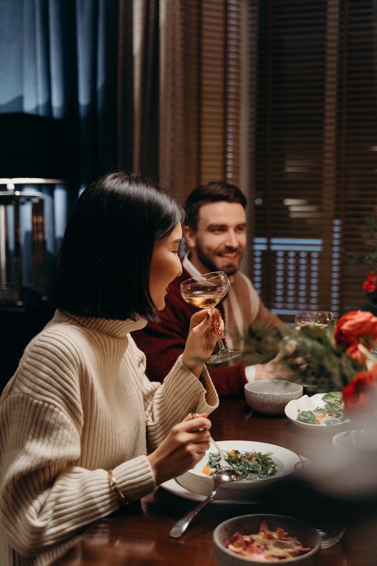 Side View Of A Woman Drinking Champagne