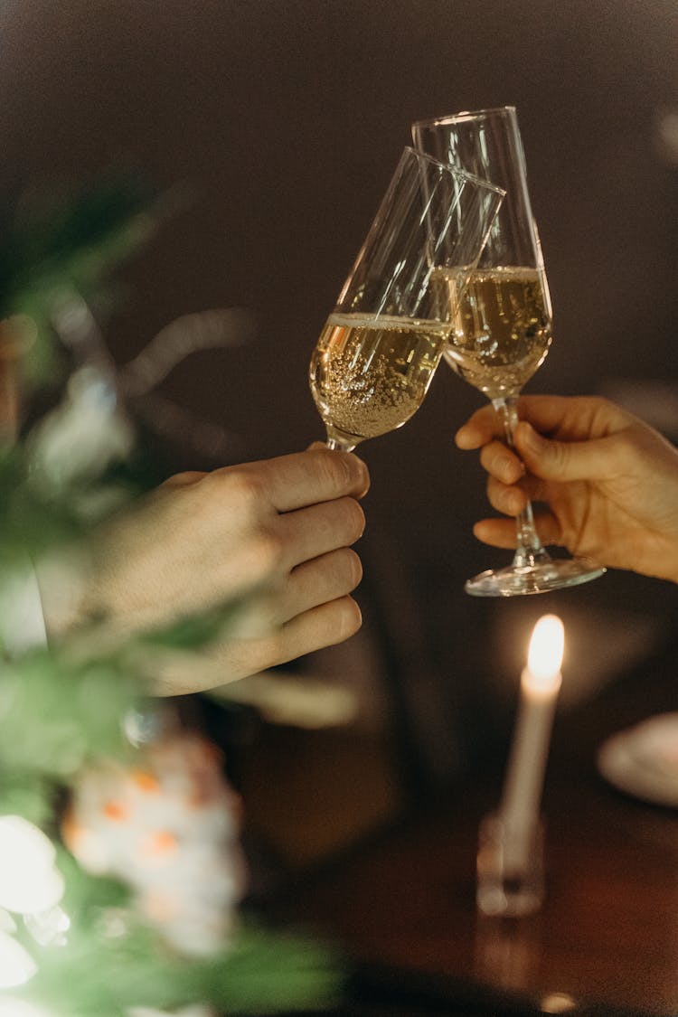 Close Up Shot Of A Toasting Champagne Glass